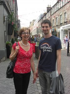 A portrait of John with his mum.